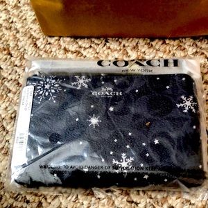 Coach corner zip wallet with snowflake